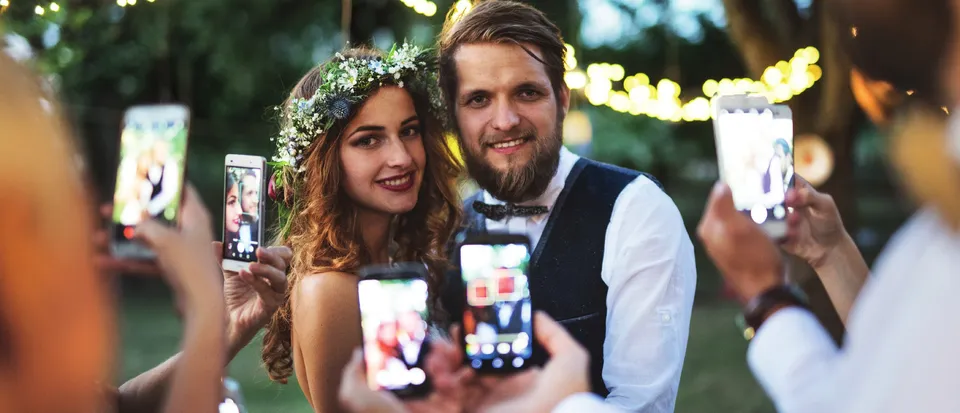 Guests printing photos at a wedding